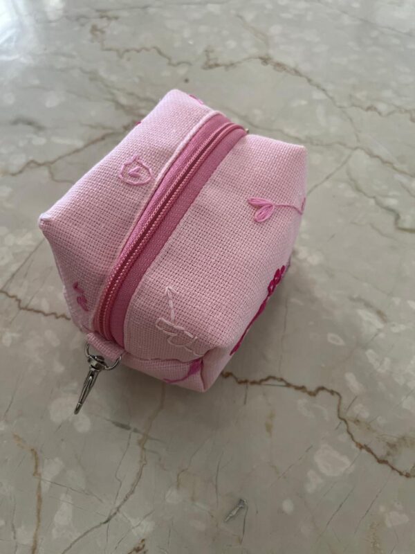 Hand embroidered jute wristlet