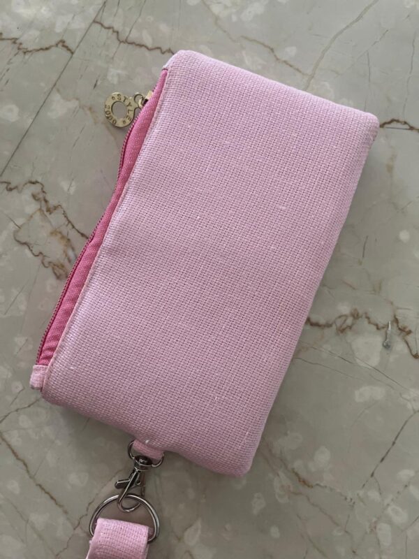 Hand embroidered jute wristlet