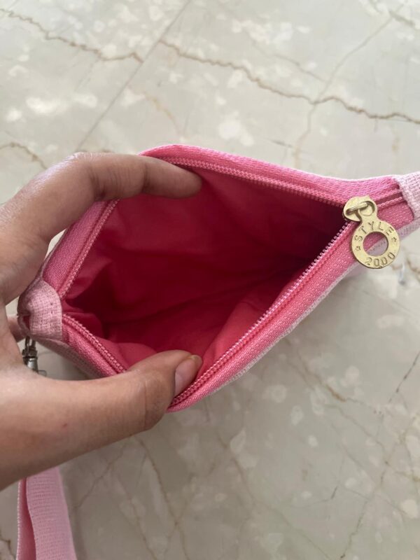 Hand embroidered jute wristlet