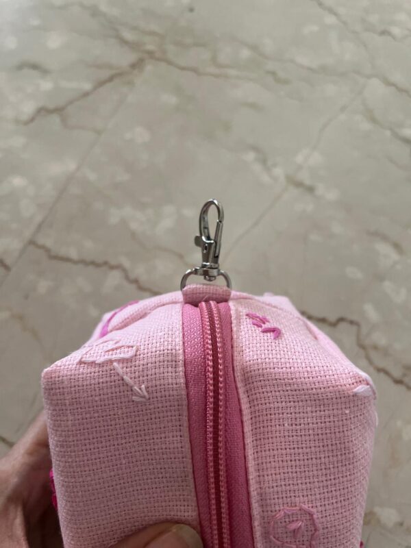 Hand embroidered jute wristlet