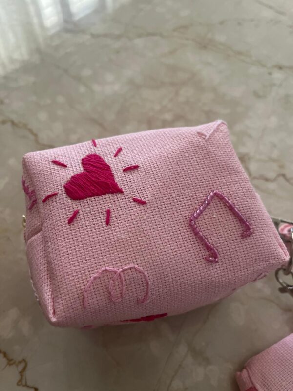 Hand embroidered jute wristlet