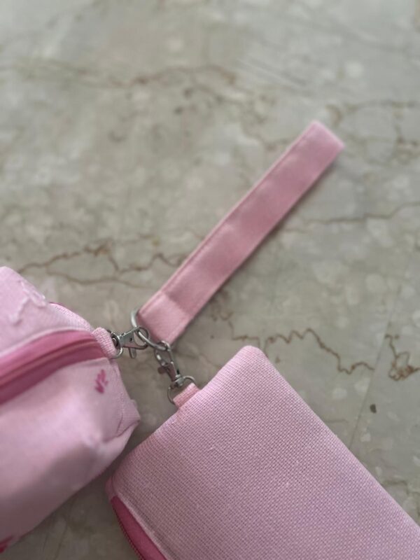 Hand embroidered jute wristlet