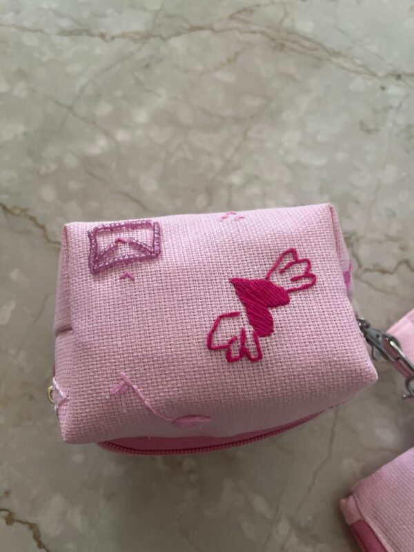 Hand embroidered jute wristlet