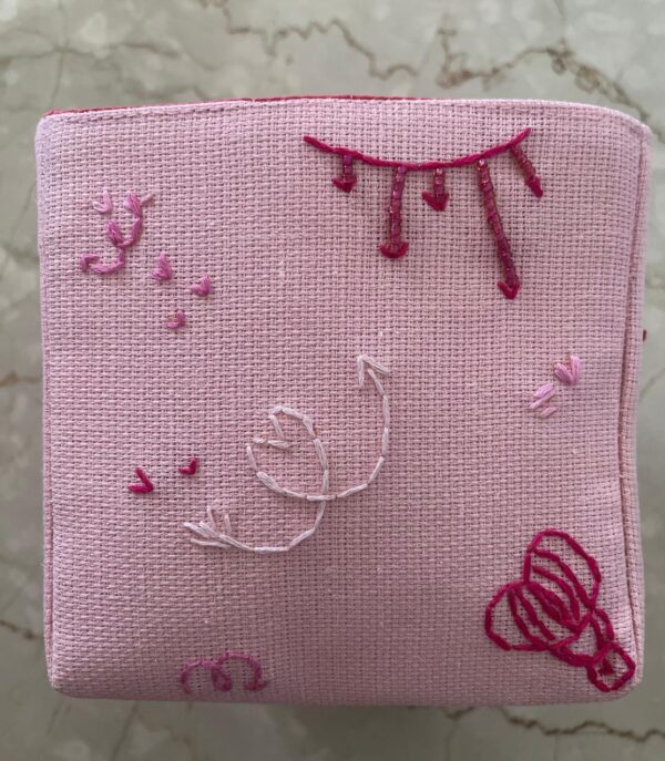 Hand embroidered jute basket
