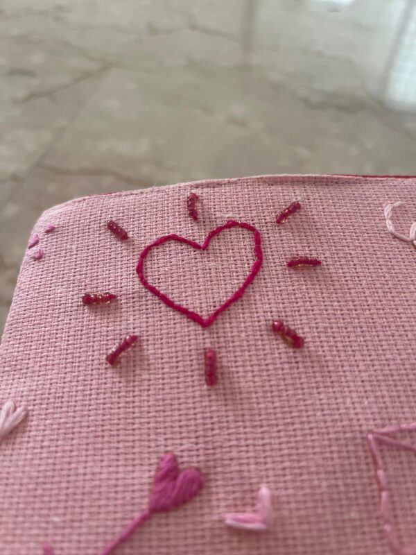 Hand embroidered jute basket